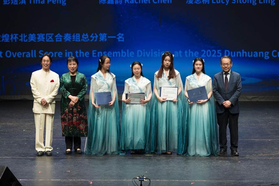 YCMA student musicians receiving awards with academy representatives